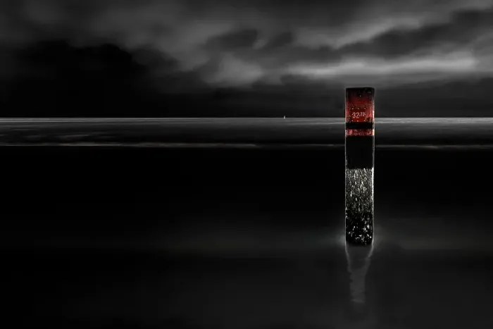 Framed Print : Landmark. Pole on the beach of Texel