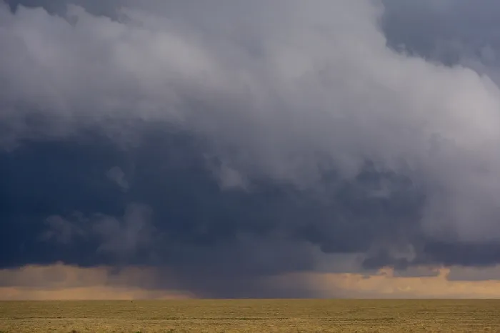 Framed Print : A rainstorm approaching in Ndutu