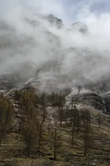 Italian Prints: Clouds over snow covered mountain in spring